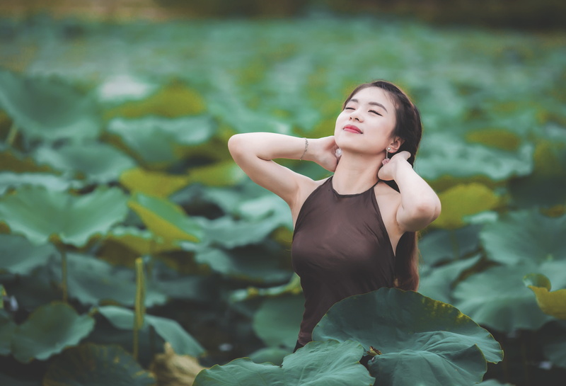 bamboo bridge, graceful, women, young women, lotus, leisure activity, young adult, nature, seductive, lifestyles, standing, hair, leaf, one person, front view