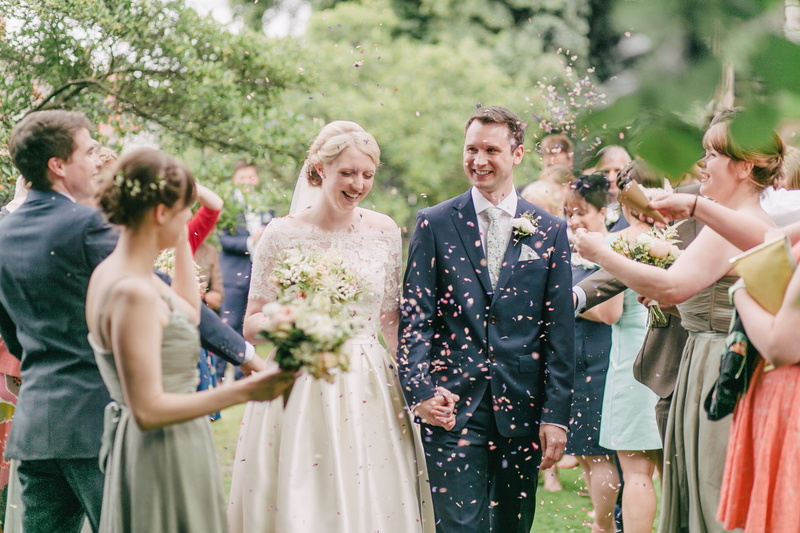young adult, suit, celebration, ceremony, crowd, flower, newlywed, event, emotion, happy, wife, life events, medium group of people, mature adult, group of people