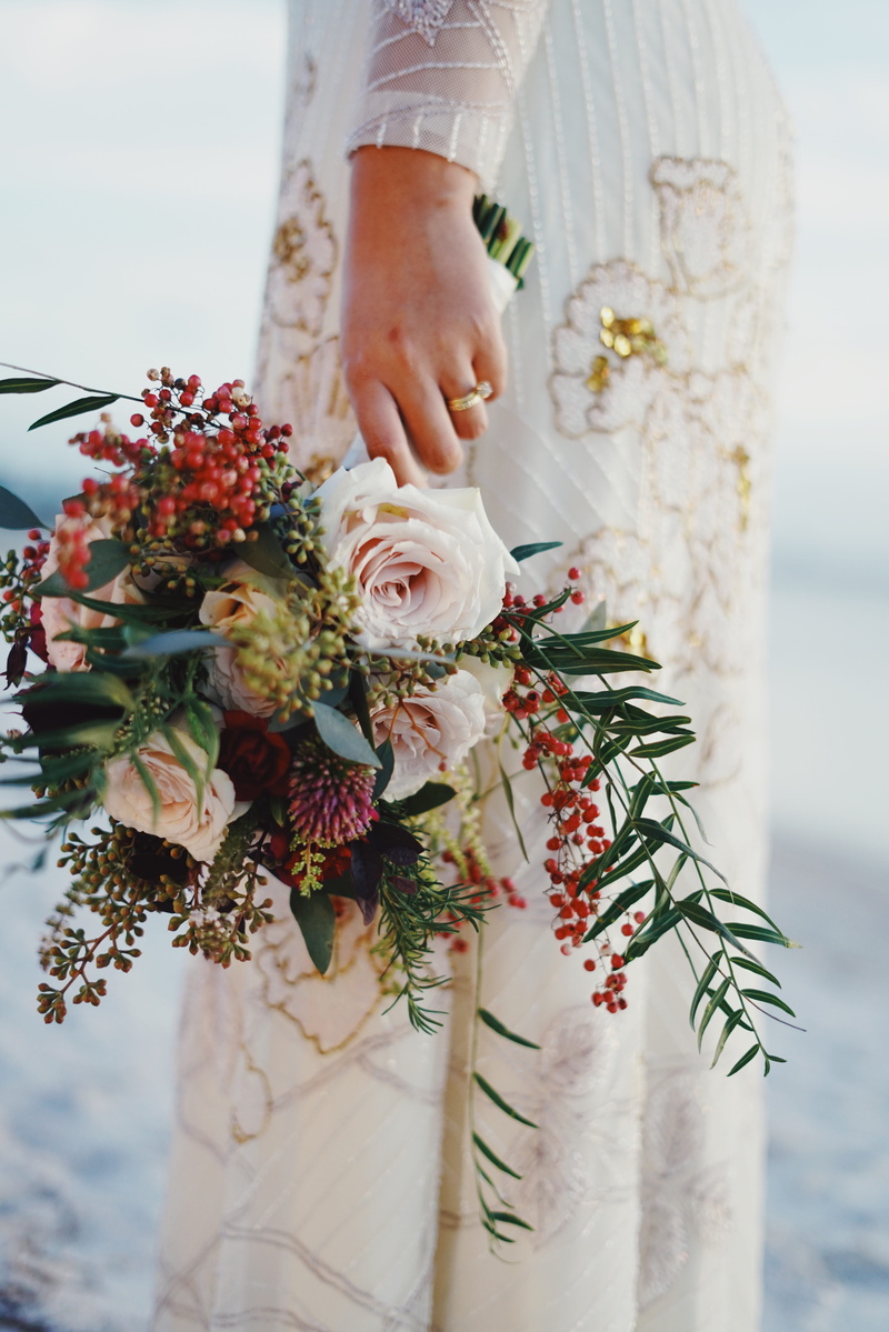 lifestyles, love, flower head, outdoors, ceremony, ring, hand, human hand, flower arrangement, flowers, dress, wedding dress, beauty in nature, beautiful