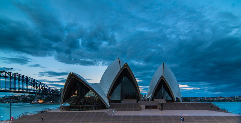 outdoors, building, connection, architecture, sydney opera house, evening, harbour, house, cityscape, iconic landmark, city, bridge, tourism, sky, building exterior