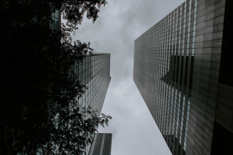 office building, tree, building exterior, plant, skyscraper, city, built structure, cloud - sky, office, 5K, architectural detail, city at night, no people