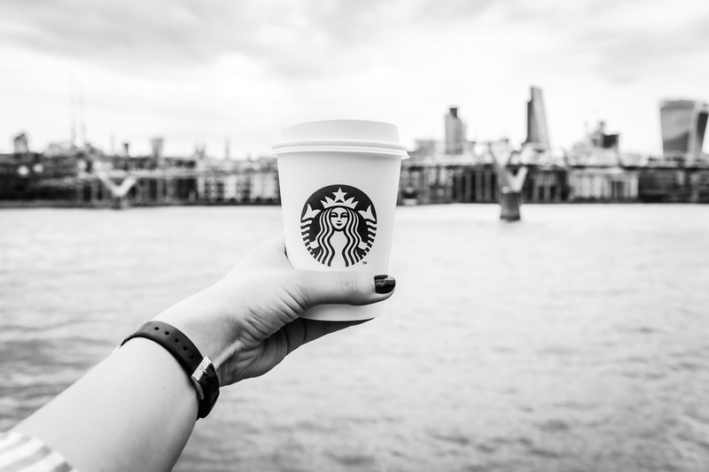 coffee, holding, drink, starbuck, body part, lifestyles, 5K, cafe, real people, outdoors, to go, coffee break, black and white, water, riverside, building exterior