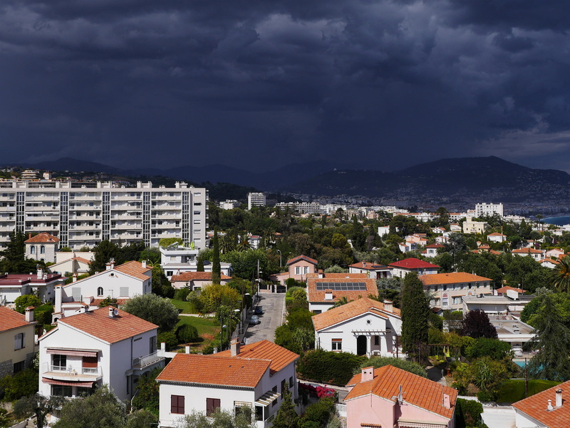 backlight, storm, subdivision, roof, settlement, black sky, forward, force, building, clouds, no people, sky, town, cityscape, squall line, storm front