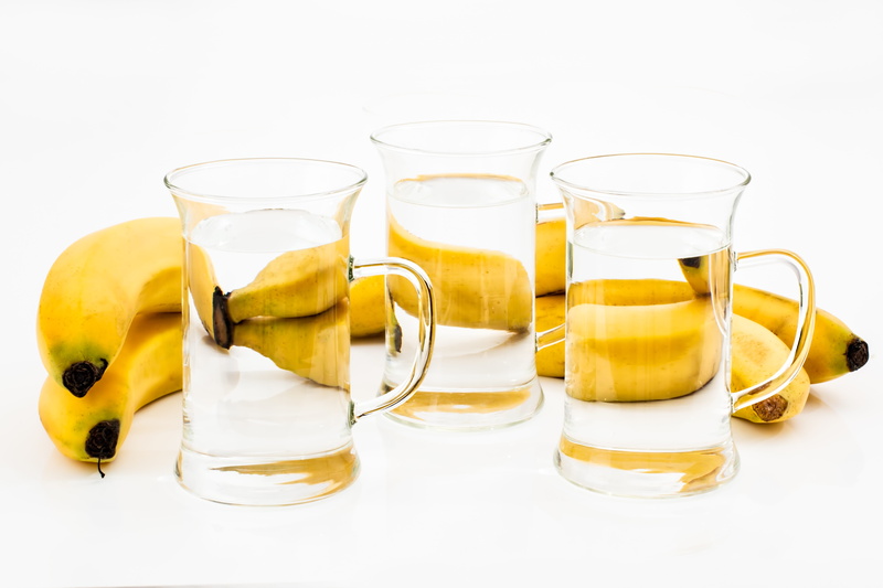studio shot, refraction, food and drink, vegan, crockery, glassware, summer, cool, water, slice, vegetarian, vitamin, yellow, cut out, reflection, bananas