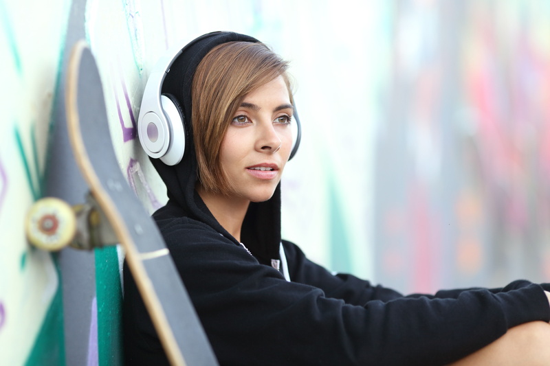 beauty, 5K, street, headphones, smiling, portrait, hair, adult, focus on foreground, headshot, skateboarding, clothing, hairstyle, beautiful woman, long hair