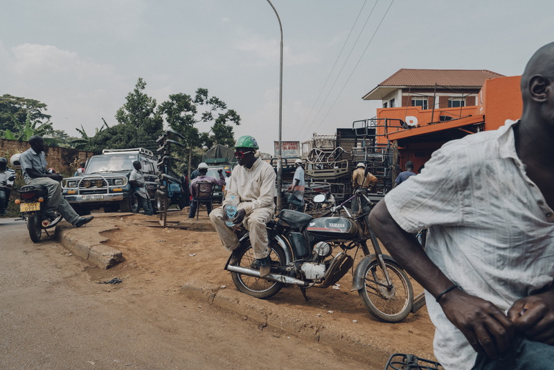 motor, building exterior, helmet, machine, city, land vehicle, cool, car, architecture, men, uganda, clothing, truck, motorcycle, kampala, group of people