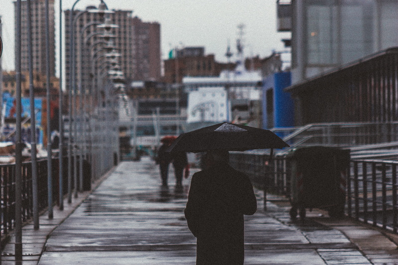 built structure, city, rain, genova, silhouette, city life, adult, woman, urban, building, walking, holding, protection, mood, street, path, streetart