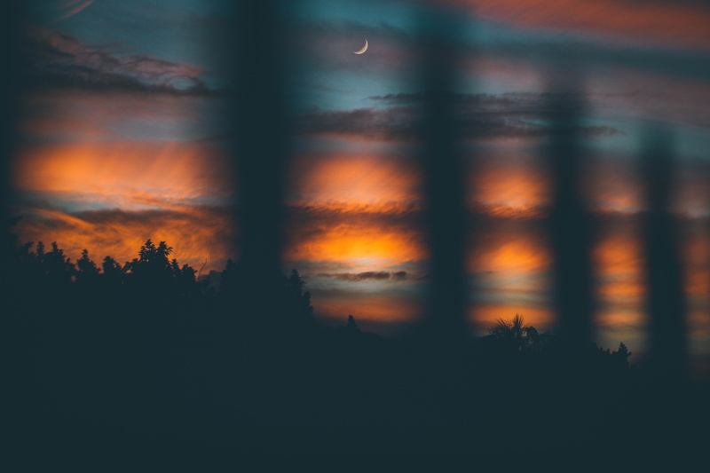 silhouette, beauty in nature, idyllic, crescent, outdoors, clouds, moon, plant, window, non-urban scene, no people, dusk, orange color, sunset, tranquil scene