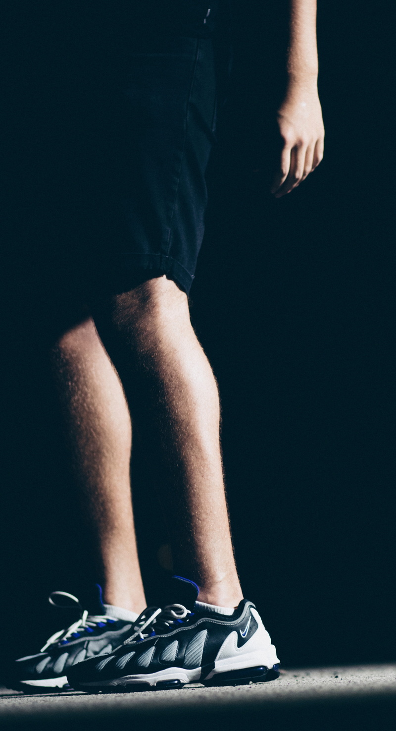 real people, casual clothing, dark, men, human leg, human body part, low section, 5K, black, short, miramar, nike, feet, nightime, body part, leisure activity