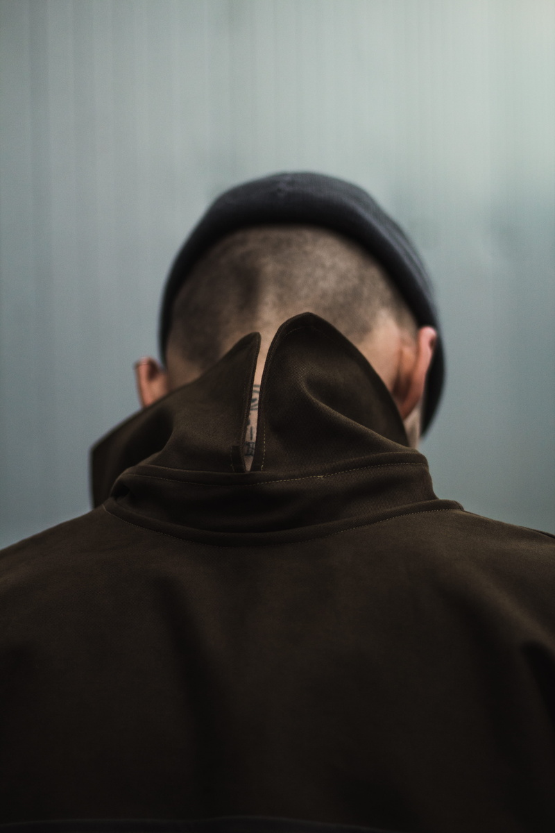 fashion photography, street wear, fashion, adult, hat, islam, religion, style, person, mugger, males, man, clothing, burglar, head bowed, conflict, serious