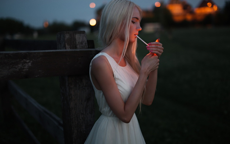 lifestyles, hairstyle, three quarter length, women, real people, profile, standing, beautiful woman, smoking, white dress, leisure activity, pink nails