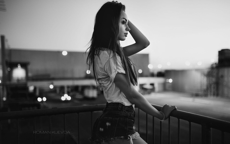 leisure activity, railing, illuminated, outdoors, beautiful woman, one person, women, jean shorts, focus on foreground, profile, lights, 1080P, standing