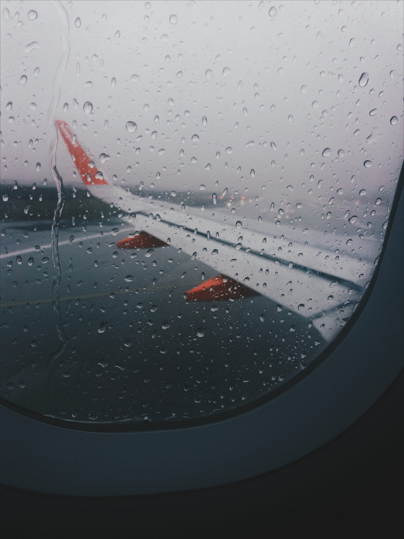water, mode of transportation, no people, nature, wing, rainy season, window, plane, vehicle interior, close-up, airplane, indoors, rainy, tarmac, wet