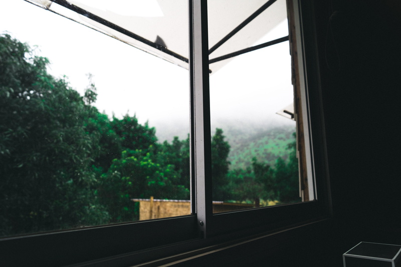 curtain, rail transportation, building, built structure, no people, focus on foreground, utility pole, photography, nature, glass - material, mood, fog
