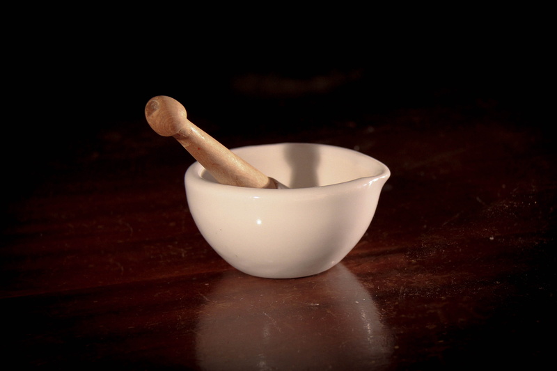 food, botany, healthy eating, indoors, freshness, mortar and Pestle, spoon, ancient, white color, focus on foreground, 4K, black background, eating utensil