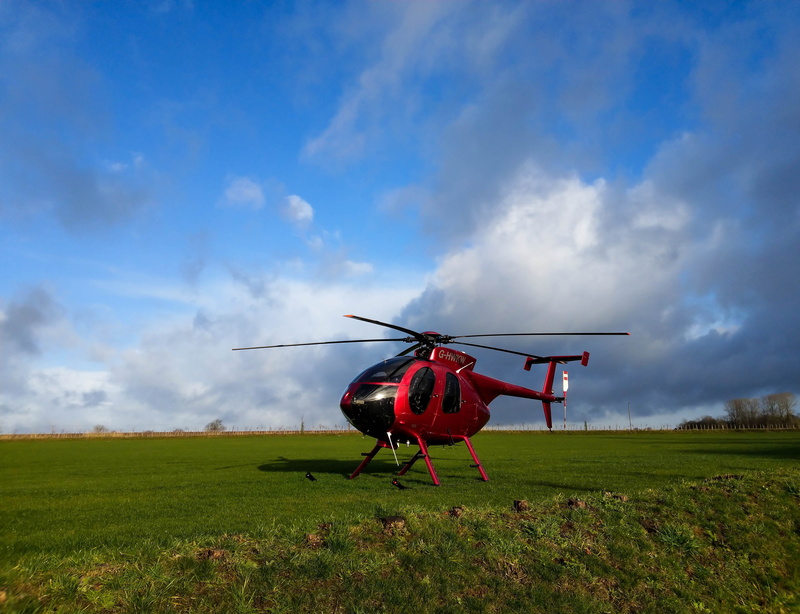 field, transportation, cloud - sky, red helicopter, hughes md 500, 4K, environment, landscape, day, airplane, no people, helicopter on grass, flying, motion