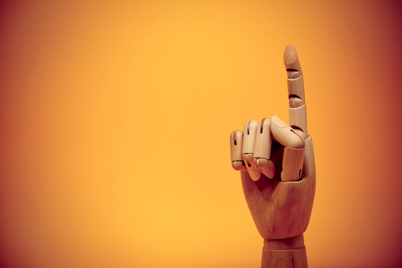 paper, 5K, art and craft, no people, close-up, wall - building feature, brown, copy space, decor, holding, orange background, robot, index finger, technology