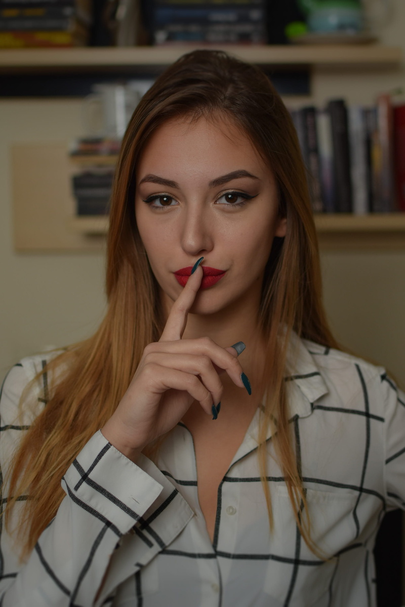 real people, nail, front view, headshot, indoors, lifestyles, closer, beautiful woman, lips, putting, portrait, woman, focus on foreground, hairstyle, index