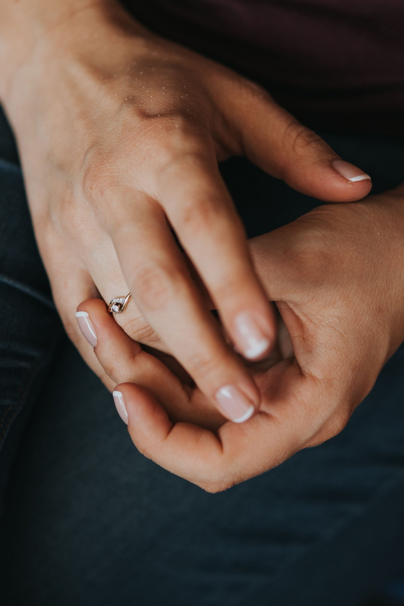 finger, positive emotion, adult, togetherness, heterosexual couple, touching, two People, couple - relationship, real people, holding, ring, body part