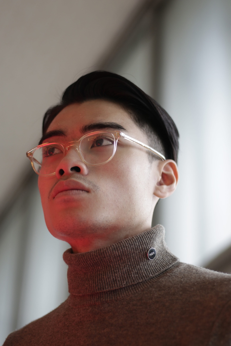 lip, one person, real people, focus on foreground, face, portrait, 5K, neck, human, sweater, goggles, accessories, accessory, sleeve, wearing, looking away