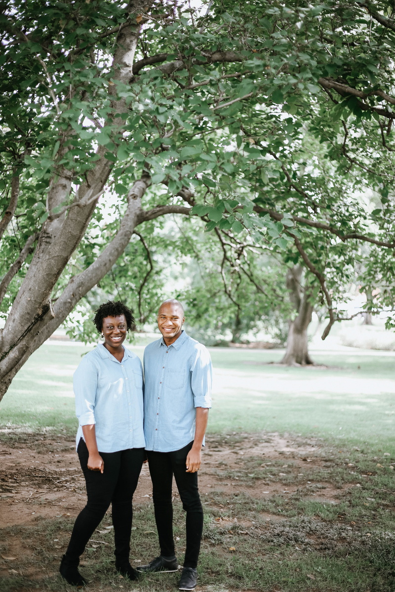 couple, two people, mature men, blurred background, daytime, outdoors, humans, standing, male model, branch, fashionable, full length, environment, together