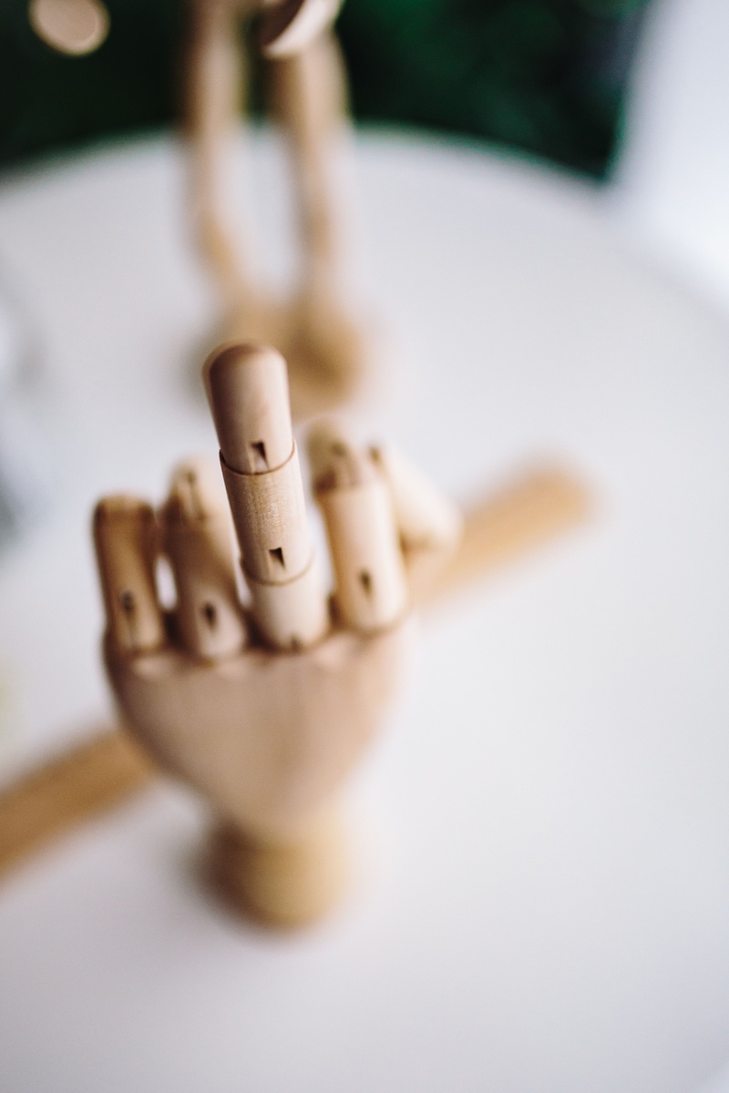selective focus, representing, white background, representation, food and drink, no people, male likeness, poses, focus on foreground, gesture, figure