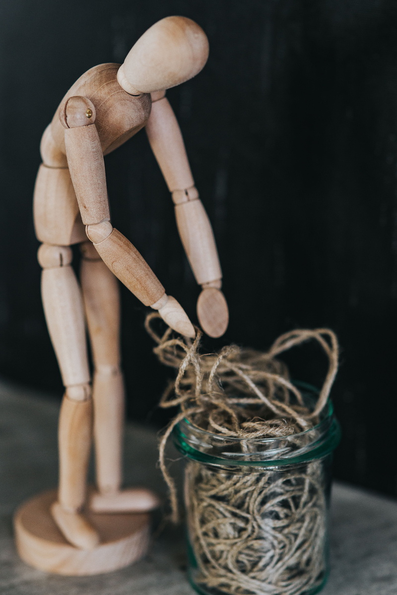 mannequin, large group of objects, tied up, indoors, yarn, 5K, art and craft, still life, work tool, table, selective focus, puppet, doll, creativity
