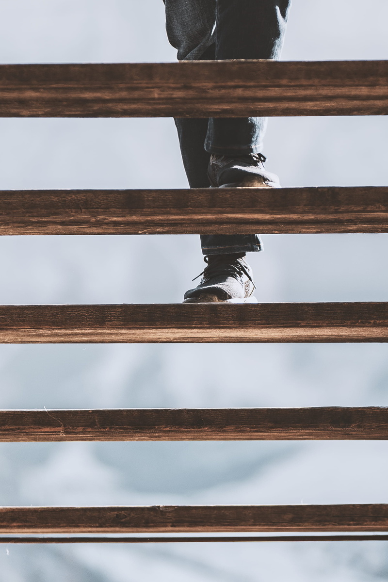 low angle view, up, wood - material, wooden, walk, 2K, standing, day, one person, railing, nature, human limb, staircase, stepping, low section, person