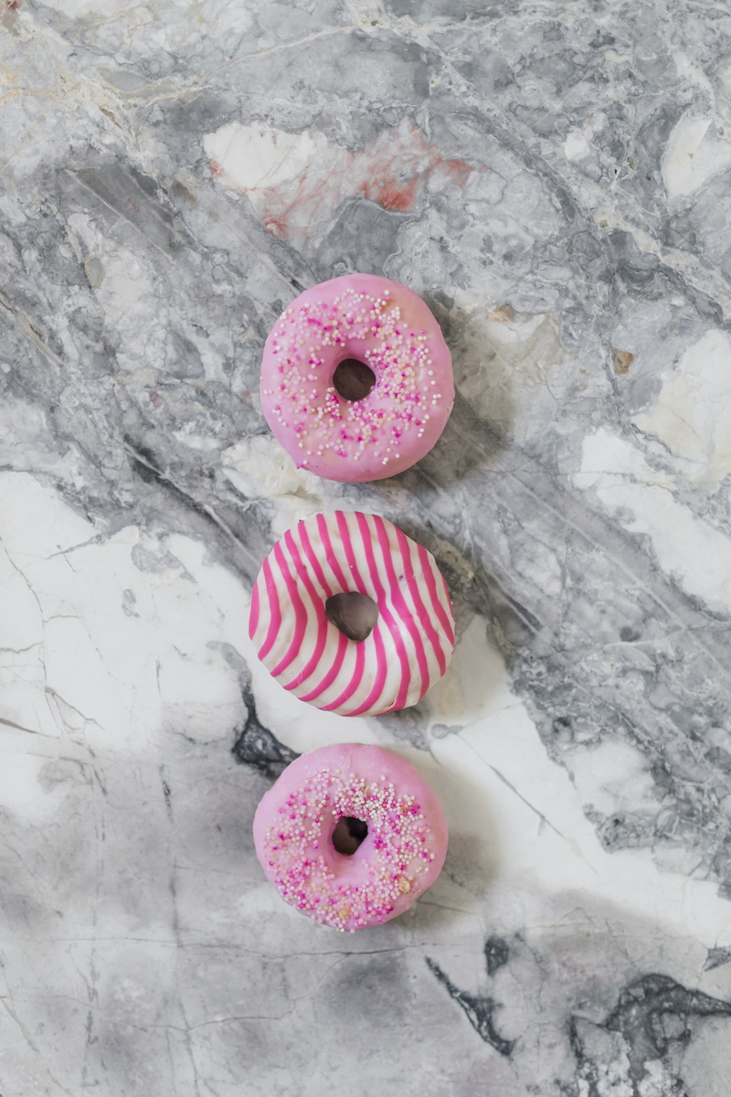 day, sweet food, still life, pink color, baked, no people, cute, donut, ready-to-eat, marble, tasty, junk food, temptation, high angle view, treat, snow