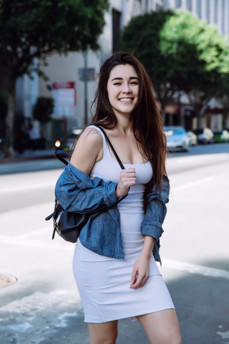 adult, emotion, three quarter length, beautiful woman, young women, hairstyle, one person, happiness, women, straight hair, casual clothing, shorts, brunette