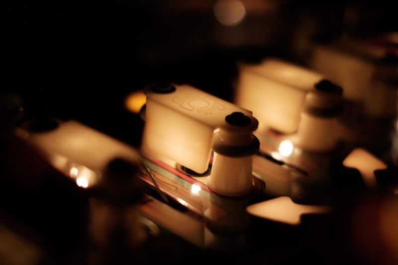 table, electric lamp, high angle view, seventies, france, domestic room, bokeh, drink, illuminated, lighting equipment, close-up, capt. fantastic, food and drink