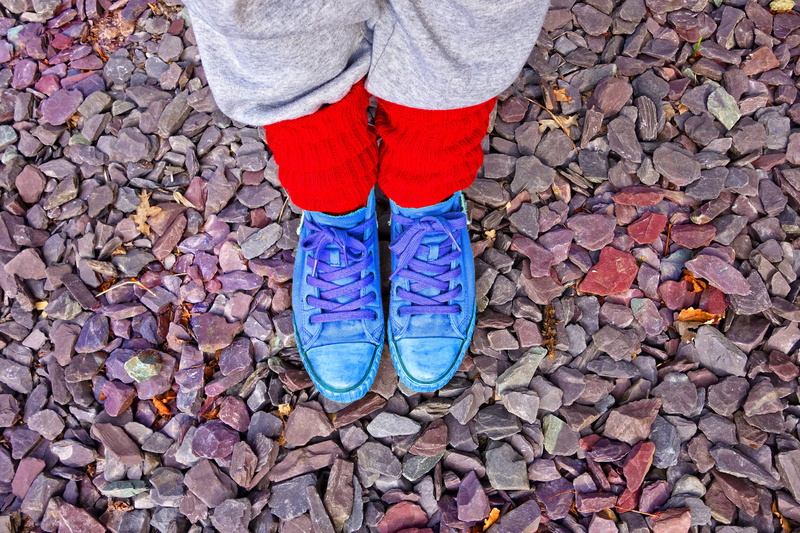 directly above, human body part, nature, human limb, low section, gravel, woman shoes, day, sneakers, hip, leg warmers, body part, woman, outdoors, pebbles