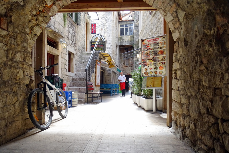 architecture, building, trogir, real people, bicycle, the way forward, old town, built structure, croatia, entrance, residential district, goal, city, alley