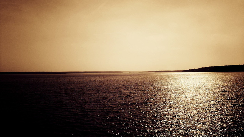 tranquil scene, horizon, tranquility, sepia, land, beauty in nature, sunlight, urban skyline, outdoors, scenics - nature, sea, 1080P, no people, seascape