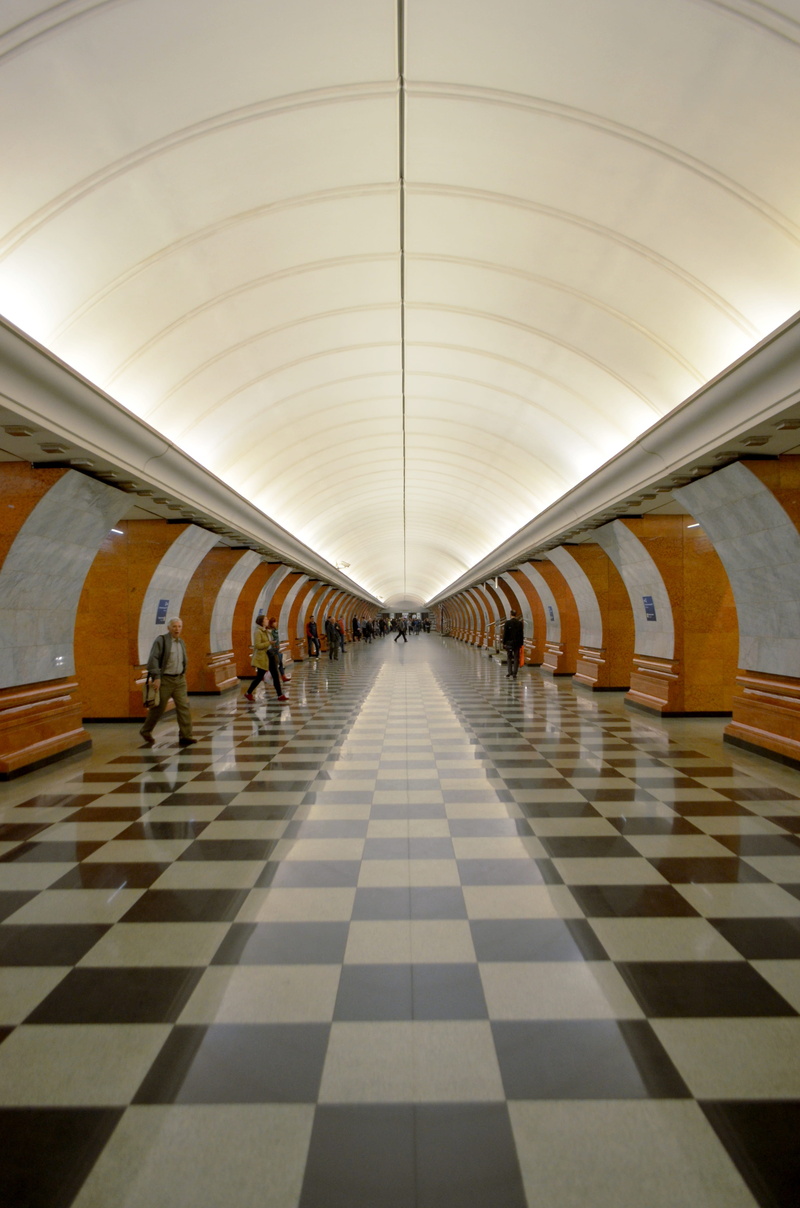 trains, built structure, pattern, checked pattern, illuminated, indoors, incidental people, tile, arcade, metro, rusia, direction, subway, ceiling, arch