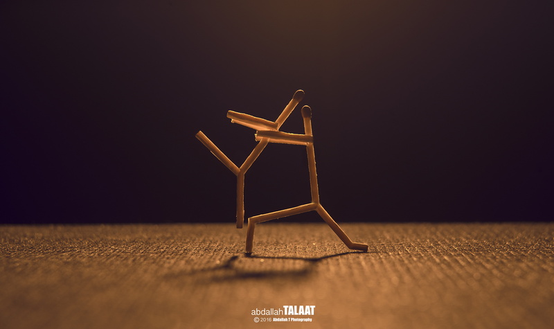 copy space, indoors, art and craft, shadow, flooring, seat, fire, single object, matchstick, ballerina, metal, built structure, table, close-up, still life
