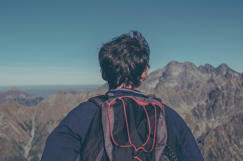 people, field, sky, mountain range, mountain, leisure activity, one man only, non-urban scene, only men, lifestyles, real people, nature, headshot, environment