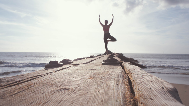 outdoors, limb, lifestyles, sky, pebble, wood, rock - object, leisure activity, standing, person, stand, rock, excercise, seashore, water, horizon over water
