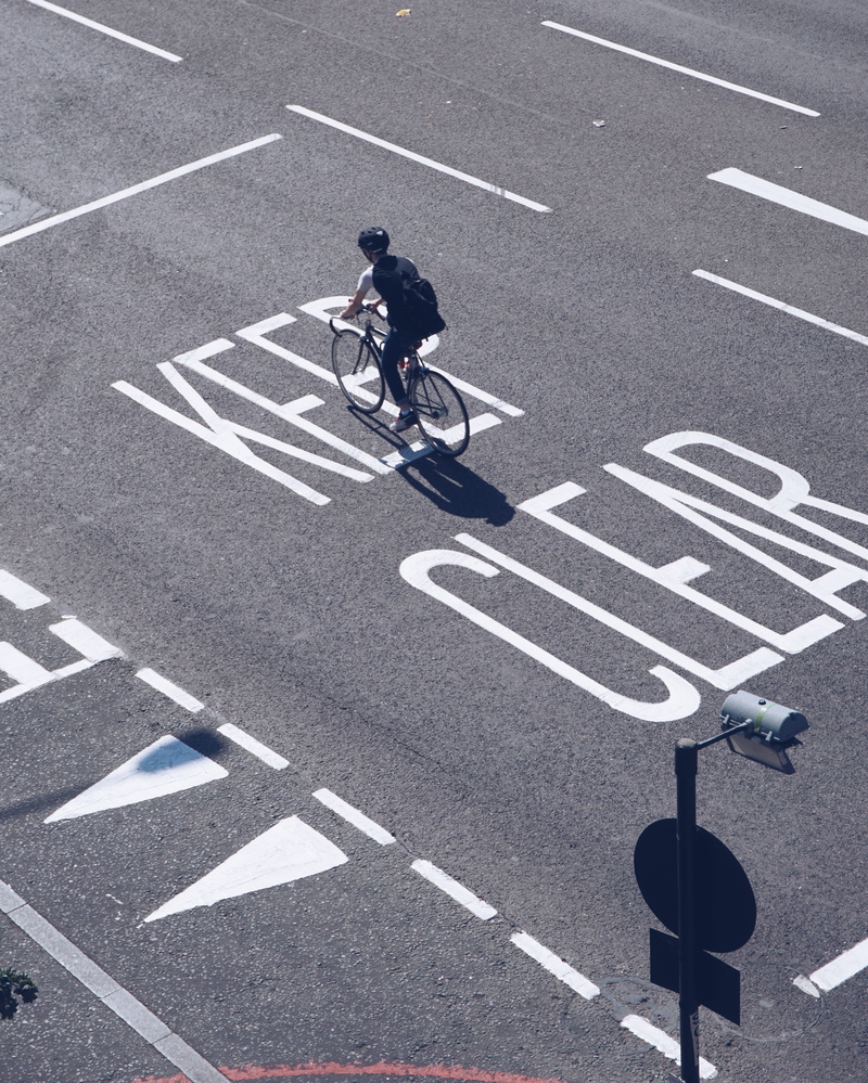 bike, sign, person, united kingdom, land vehicle, paint, sport, 4K, mode of transportation, cycling, road, city, street, men, road marking, marking, commute