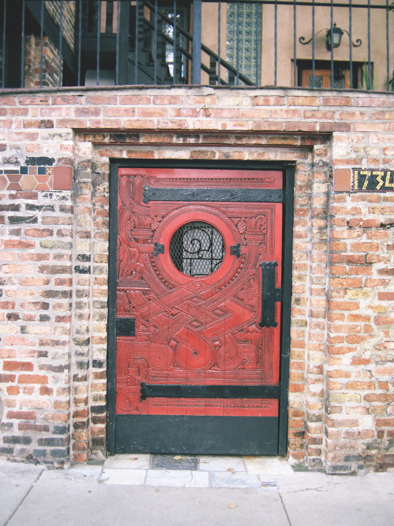 wall - building feature, creativity, secret, building, secret door, anachronism, carved, passageway, mythology, garden door, built structure, building exterior