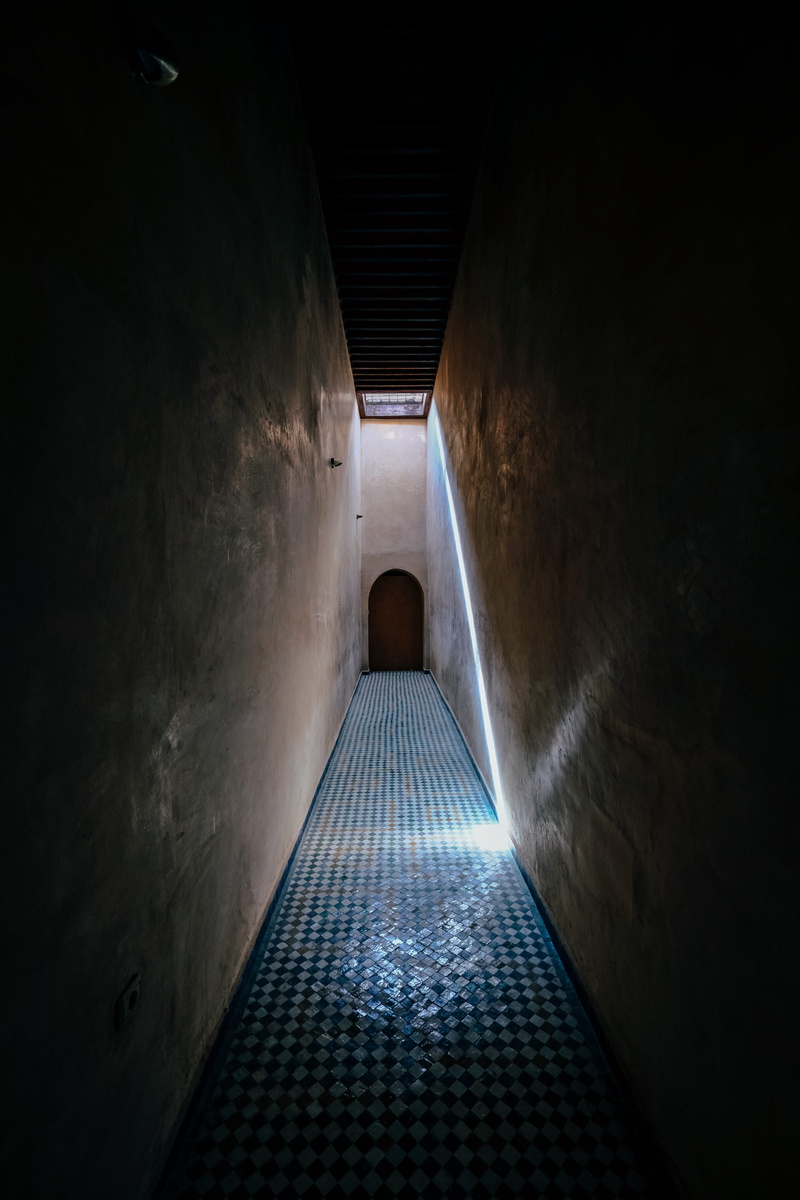 empty, ray of sunshine, dark, corridor, architecture, arch, tunnel, diminishing perspective, no people, building, gray, transportation, direction, passageway