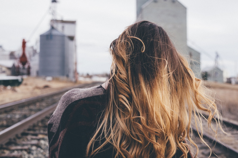 architecture, rails, hairstyle, railway, near, adults only, focus on foreground, built structure, outdoor, portrait, track, human hair, building exterior