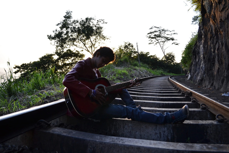 singer, one woman only, day, railroad track, 1080P, outdoors, one Person, kadugannawa, song, casual clothing, boy, sky, mawanella, transportation, track