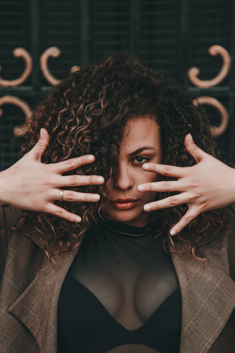women, beautiful woman, curly hair, girl, model, street, young women, suit, headshot, pose, photo, fashion, brunette, front view, outdoors, style, eye