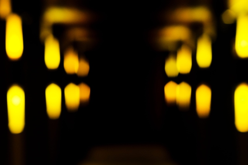 black color, prayer beads, clock, stopwatch, arts culture and entertainment, yellow, bead, leisure activities, worship, nightlife, defocused, night, wall clock
