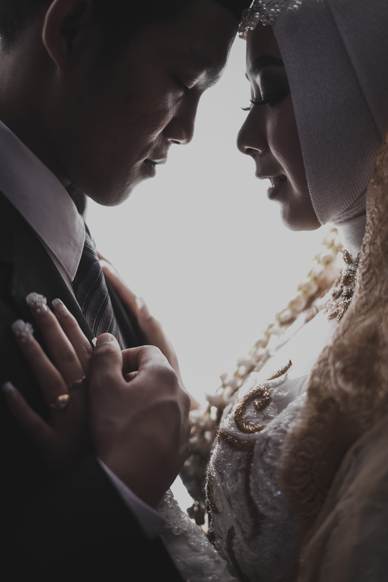 wearing, accessory, men, locket, bridal, prayer, people, lifestyles, headshot, veil, finger, clothing, real people, two people, side view, prayer beads