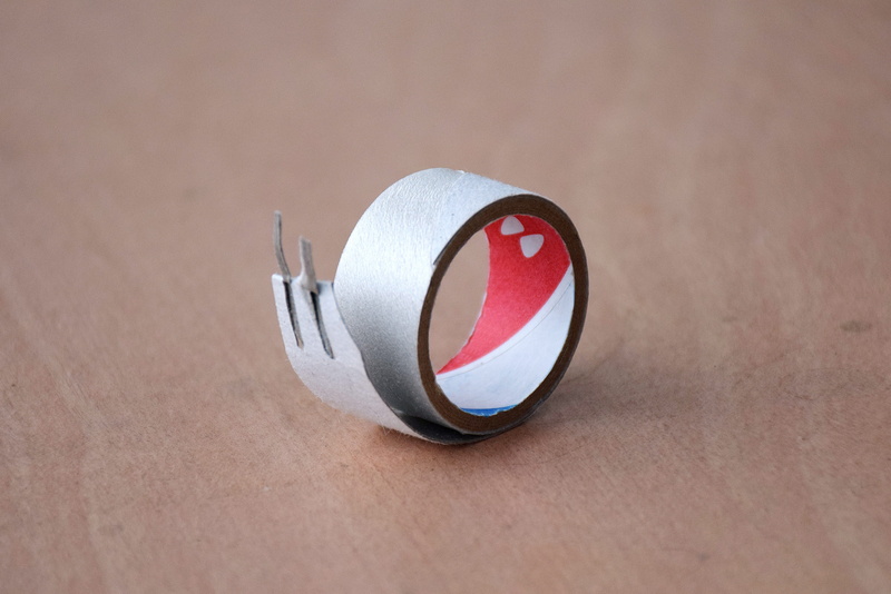 shape, no people, Paper Craft, metal, reuse, day, Handmade, conch, single object, tape, wood - material, copy space, circle, table, close-up, the cochlea