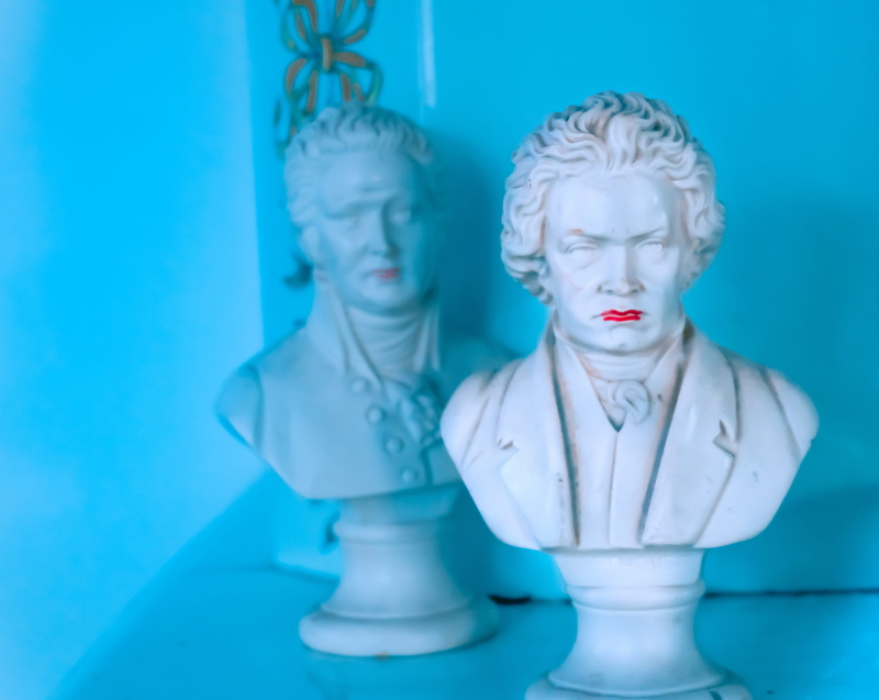 torques, board game, colored background, human representation, leisure games, chess, lipstick, blue background, male likeness, no people, art and craft