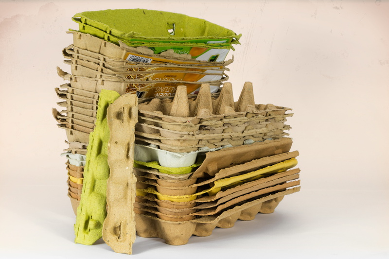 one way, white background, indoors, non recyclable waste, freshness, asparagus, empty, green color, no people, food, stack, vegetable, wicker, egg carton