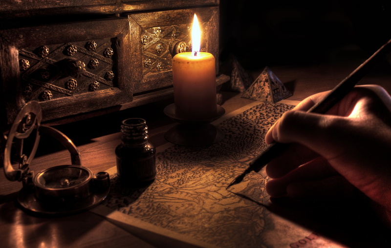 heat - temperature, human Hand, book, close-up, table, human body part, illuminated, writing, people, one person, wood - Material, fire - natural phenomenon